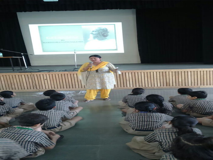 Special Assembly by class V : Remembering Gurudev.